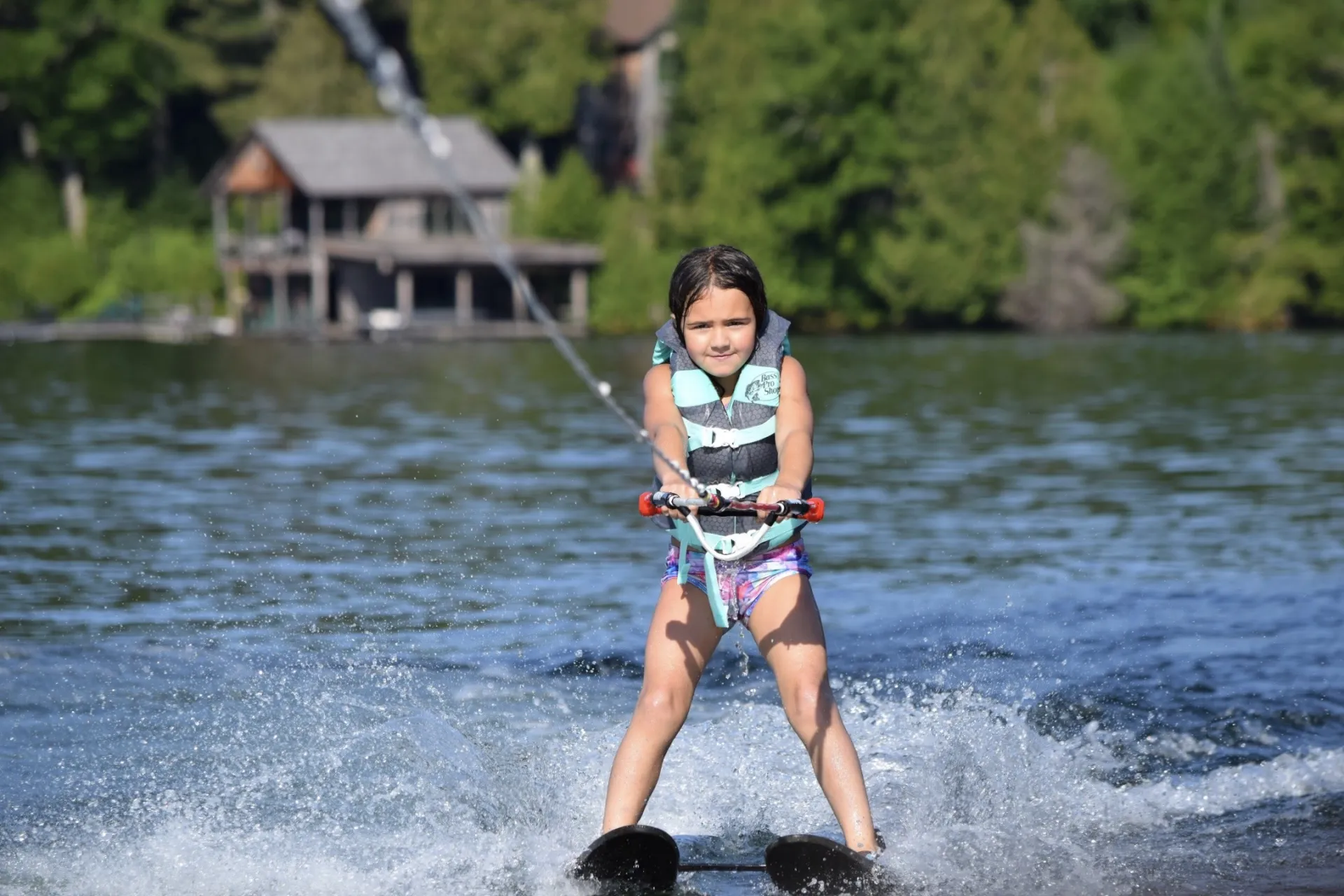 A young girl learns to ski