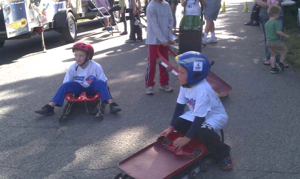 Kids enjoy wheeled luge sleds