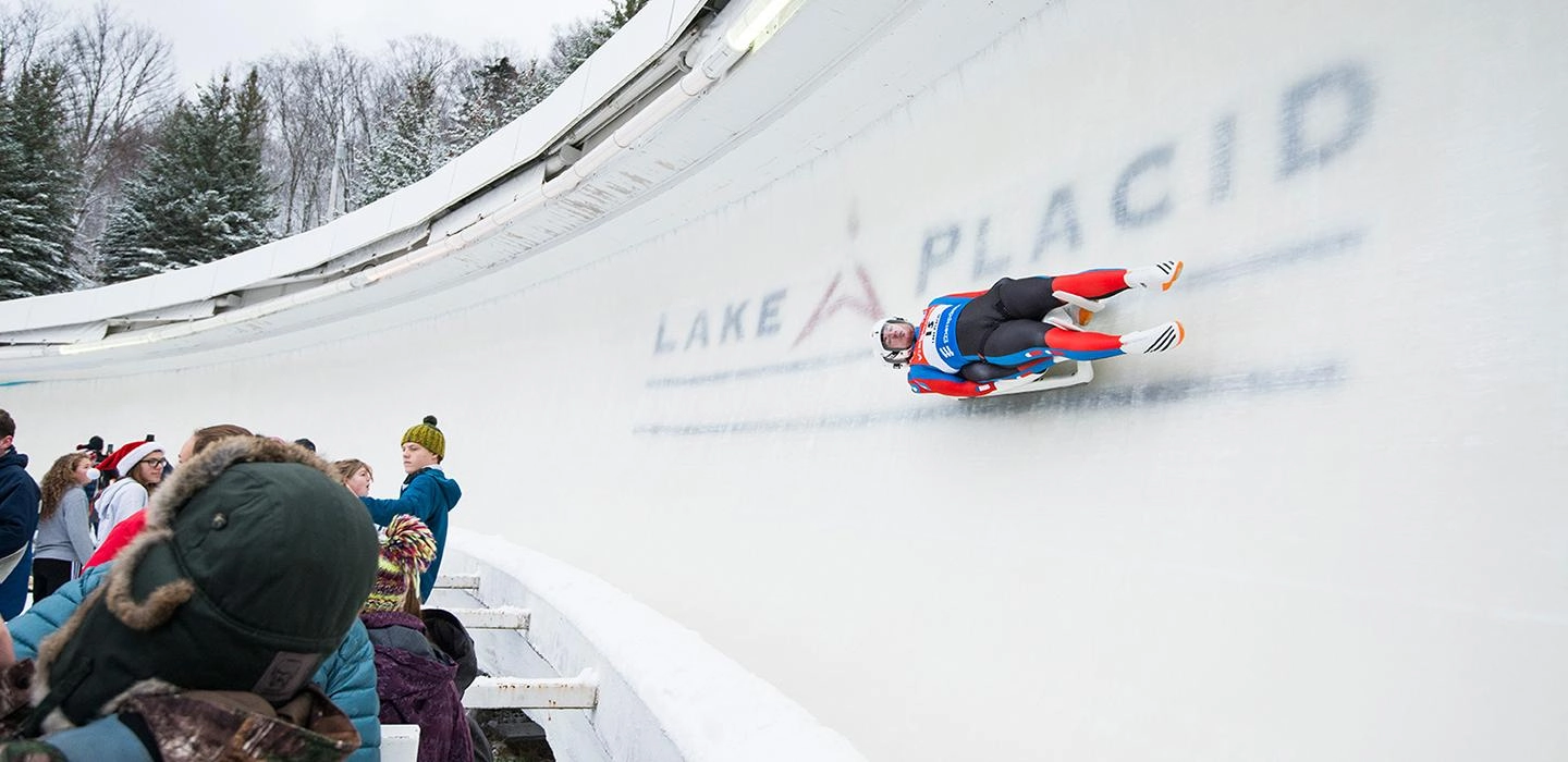 Crowd watching a luge run in Lake Placid