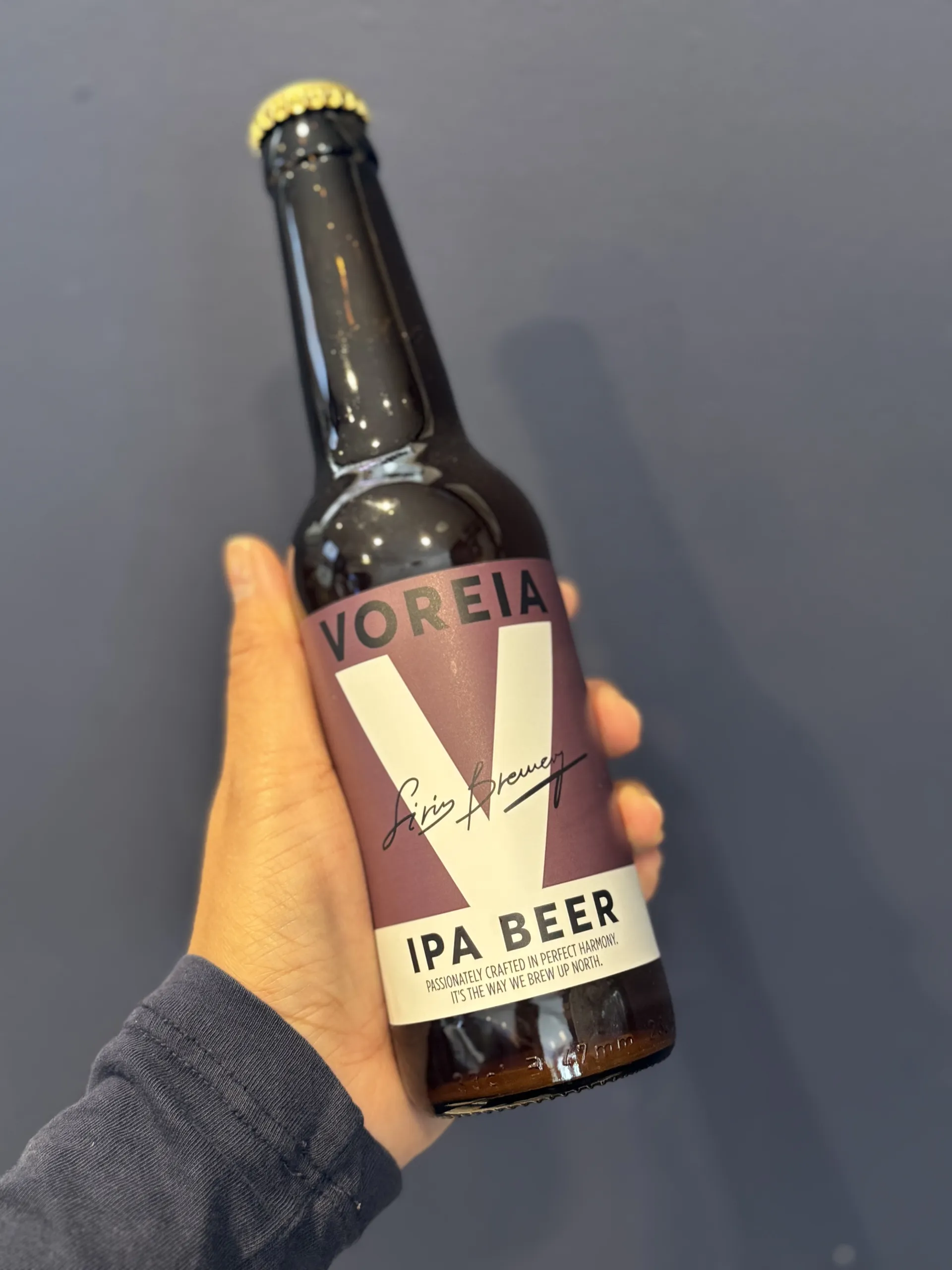 A glass bottle of Voreia IPA Beer