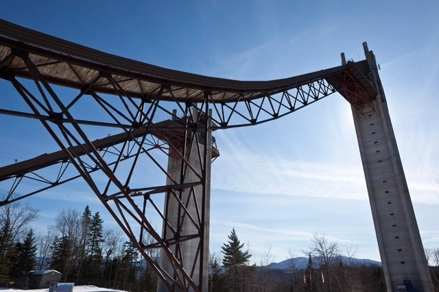 An artistic view looking up at the infrastructure that makes the Ski Jumps possible.