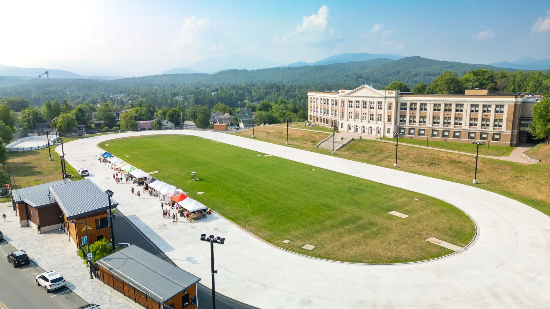 Market vendors on the oval - drone shot
