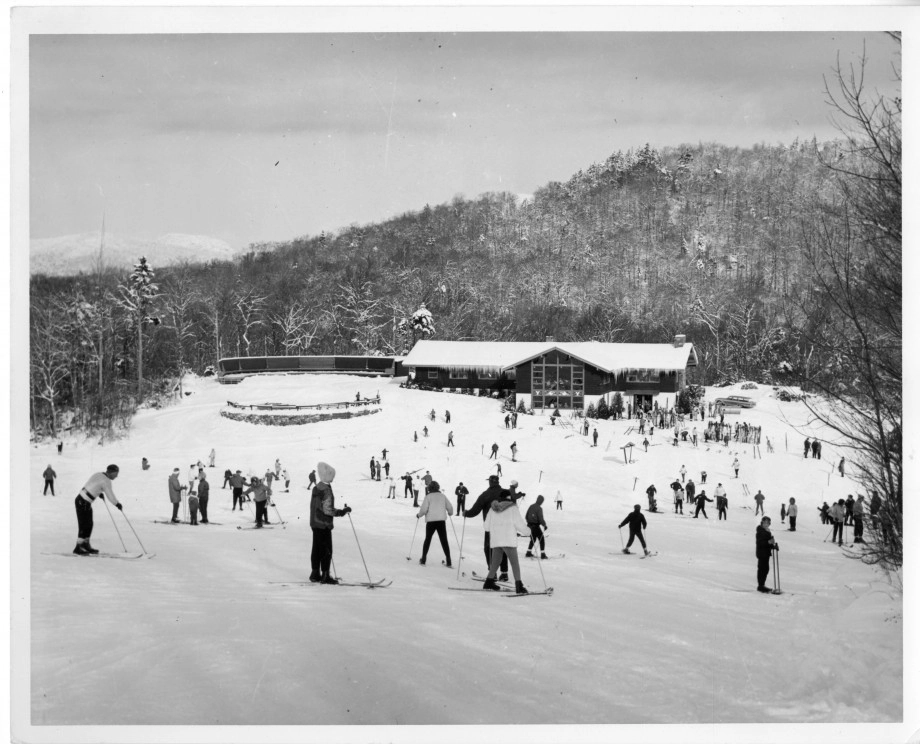 Skiers and the Mt. Whitney Lodge. Early 1960s