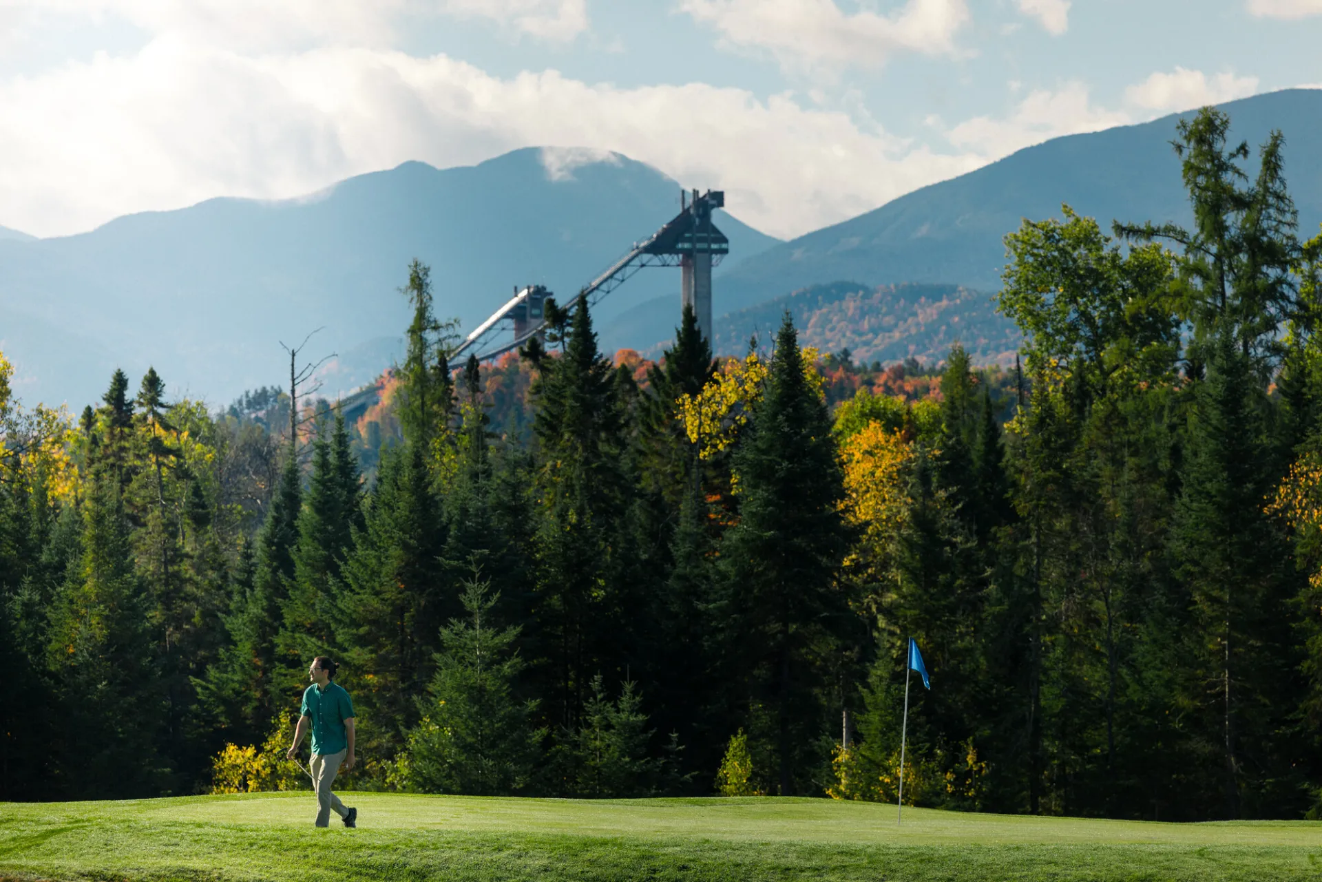 Golfing with the Ski Jumps in the background.