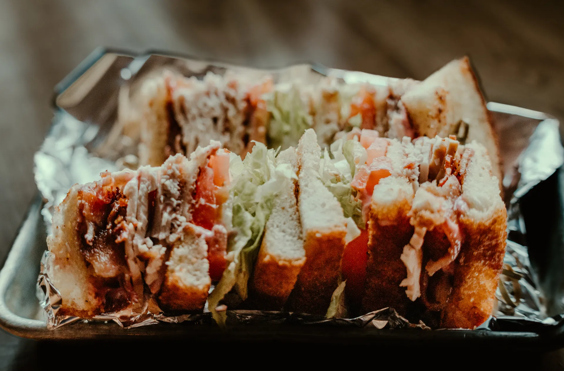 A decadent club sandwich.  Photo Credit to A. Kelly.