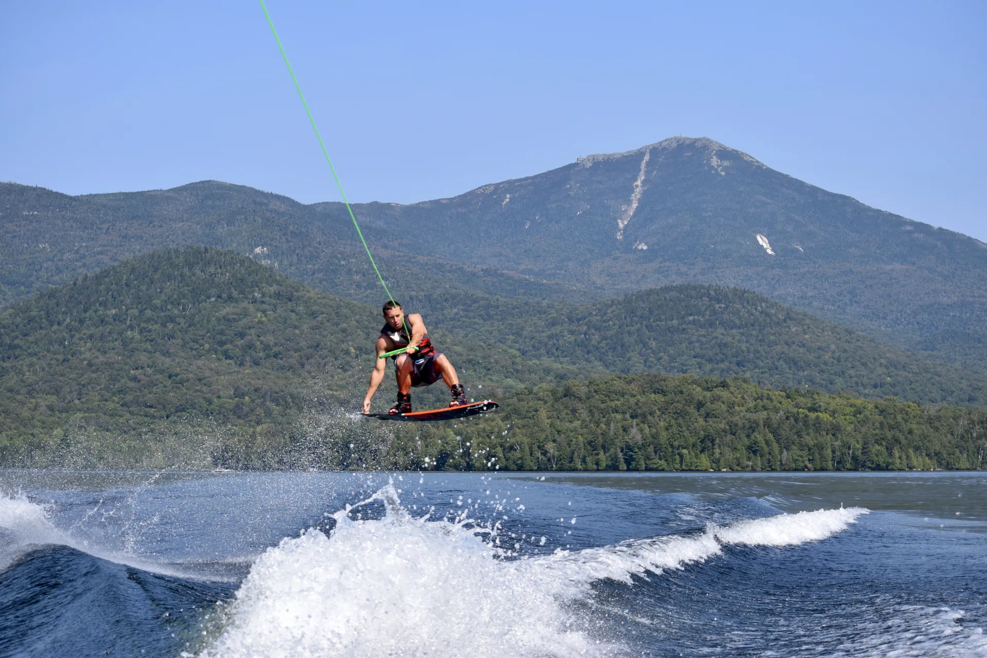 A wake boarder gets major air.