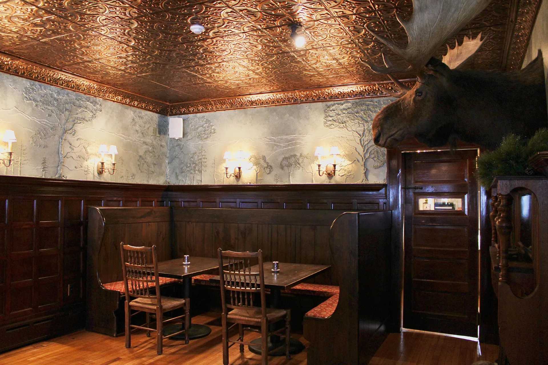 Dining space with copper ceiling.