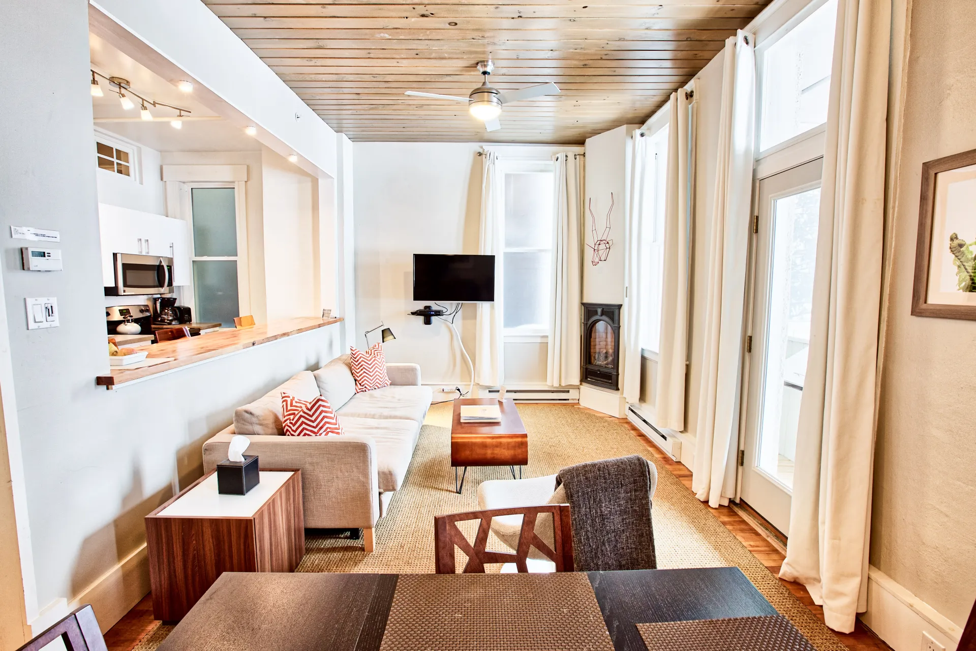 A bright and light living space with dining area.