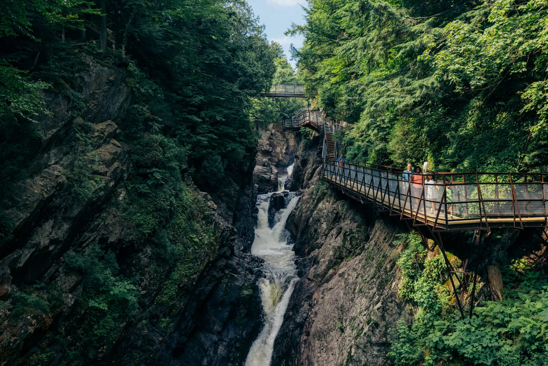 A family exploring high falls gorge.