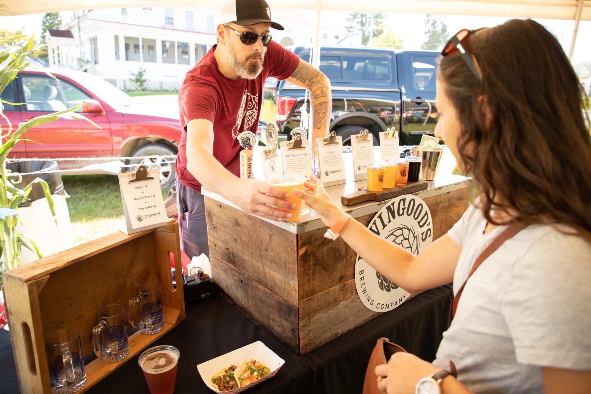 A woman served beer