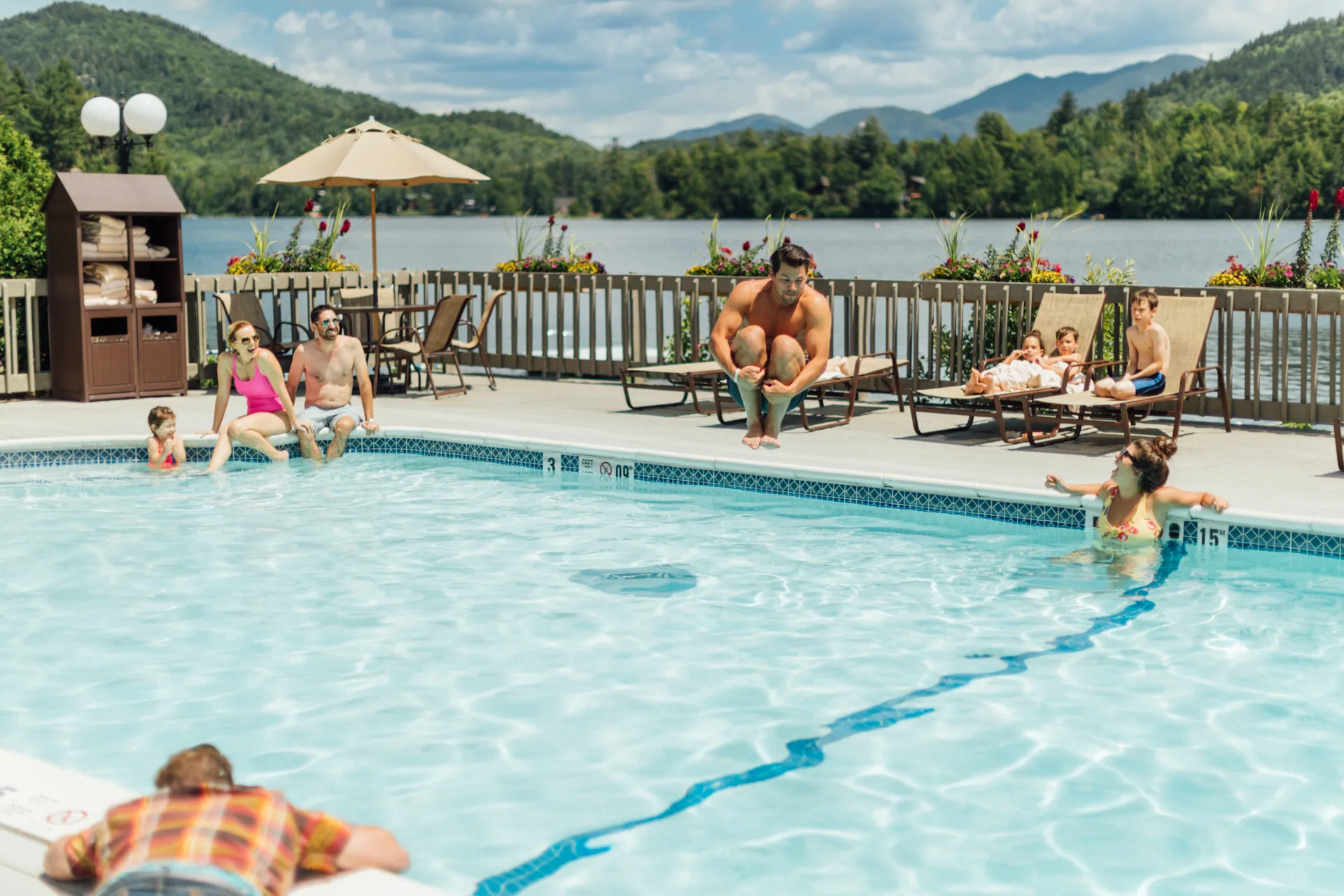 A cannon ball into the outside pool at High Peaks Resort