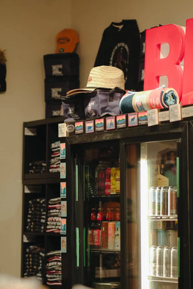 Branded swag sits atop the beer cooler
