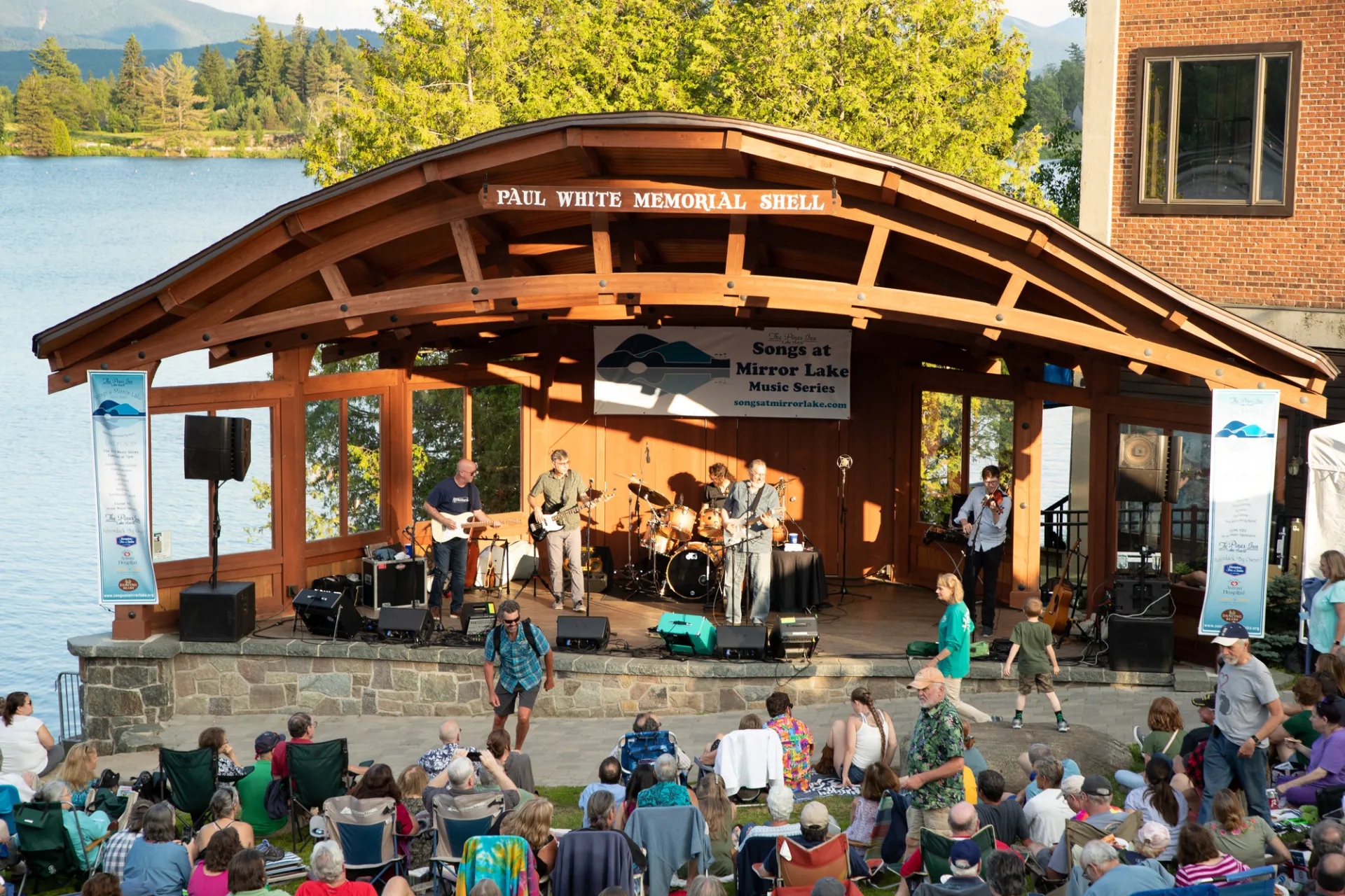 A live band performing in Mid's Park in Lake Placid