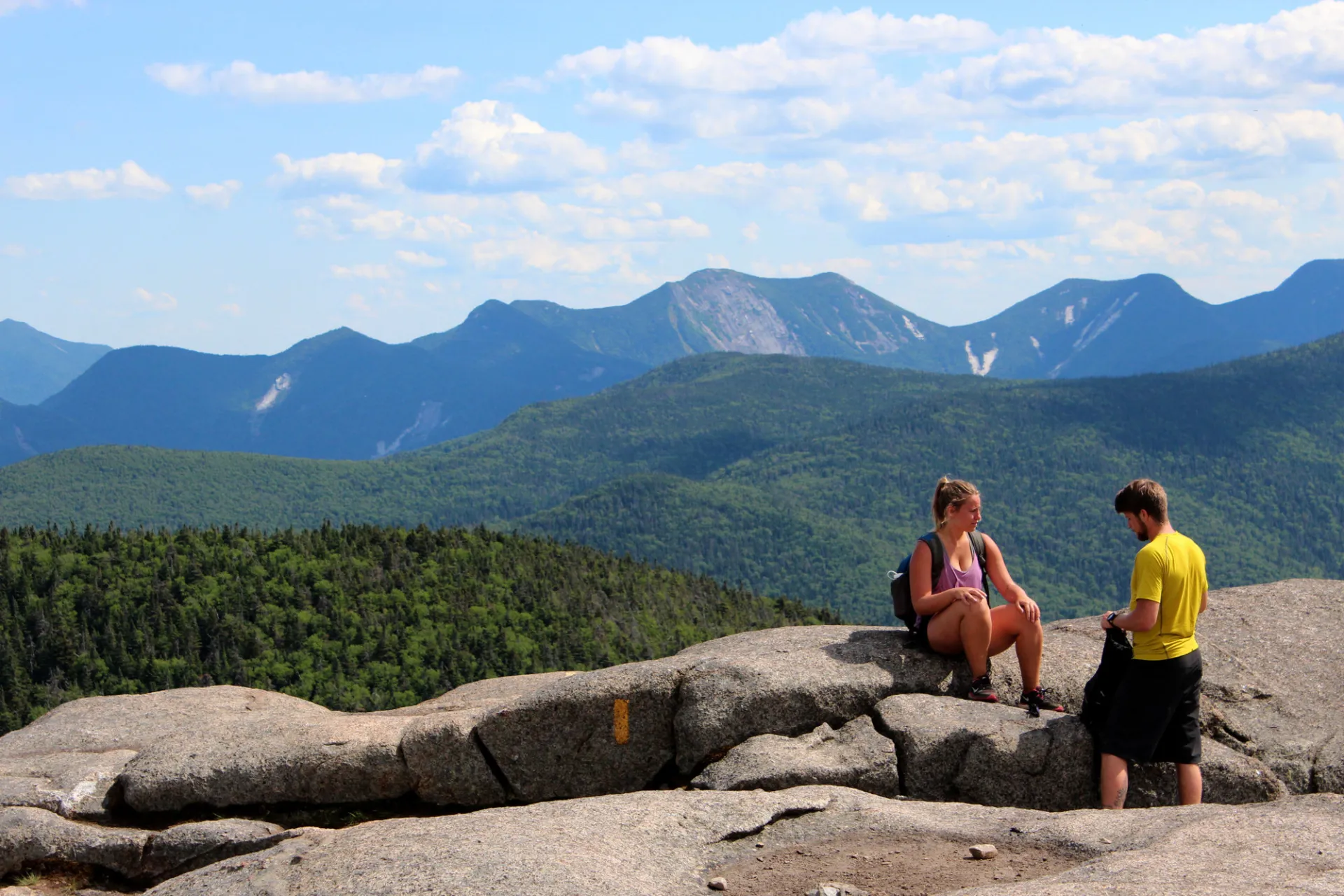 A couple people near the summit of Cascade Mountain