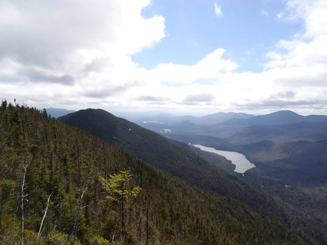 See Lower Ausable Lake from the summit of Mount Colvin.