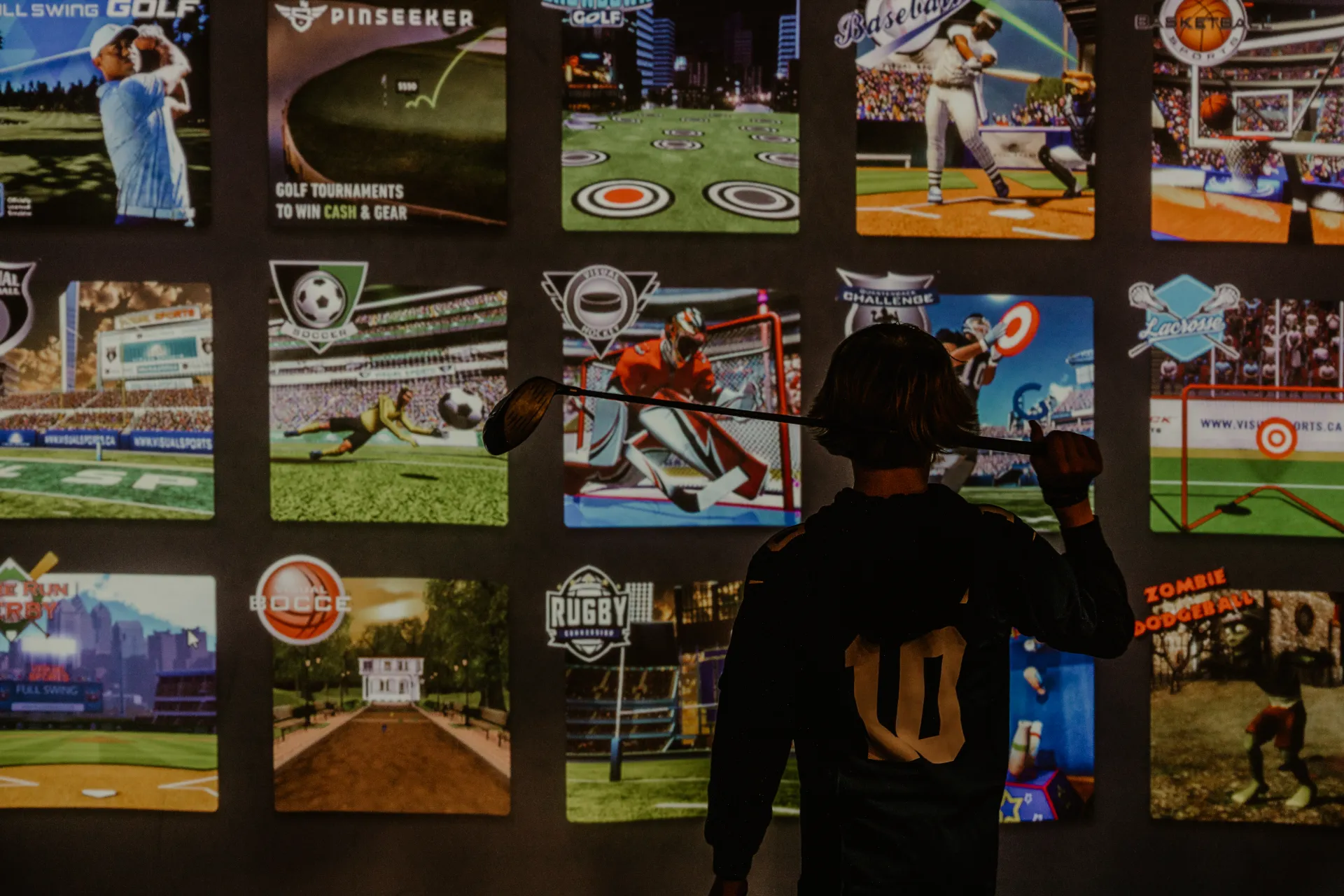 A young athlete selects his opponent in the simulator game.