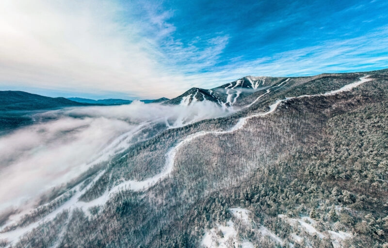 An aerial view of the ski trails on Whiteface Mountain in the winter.