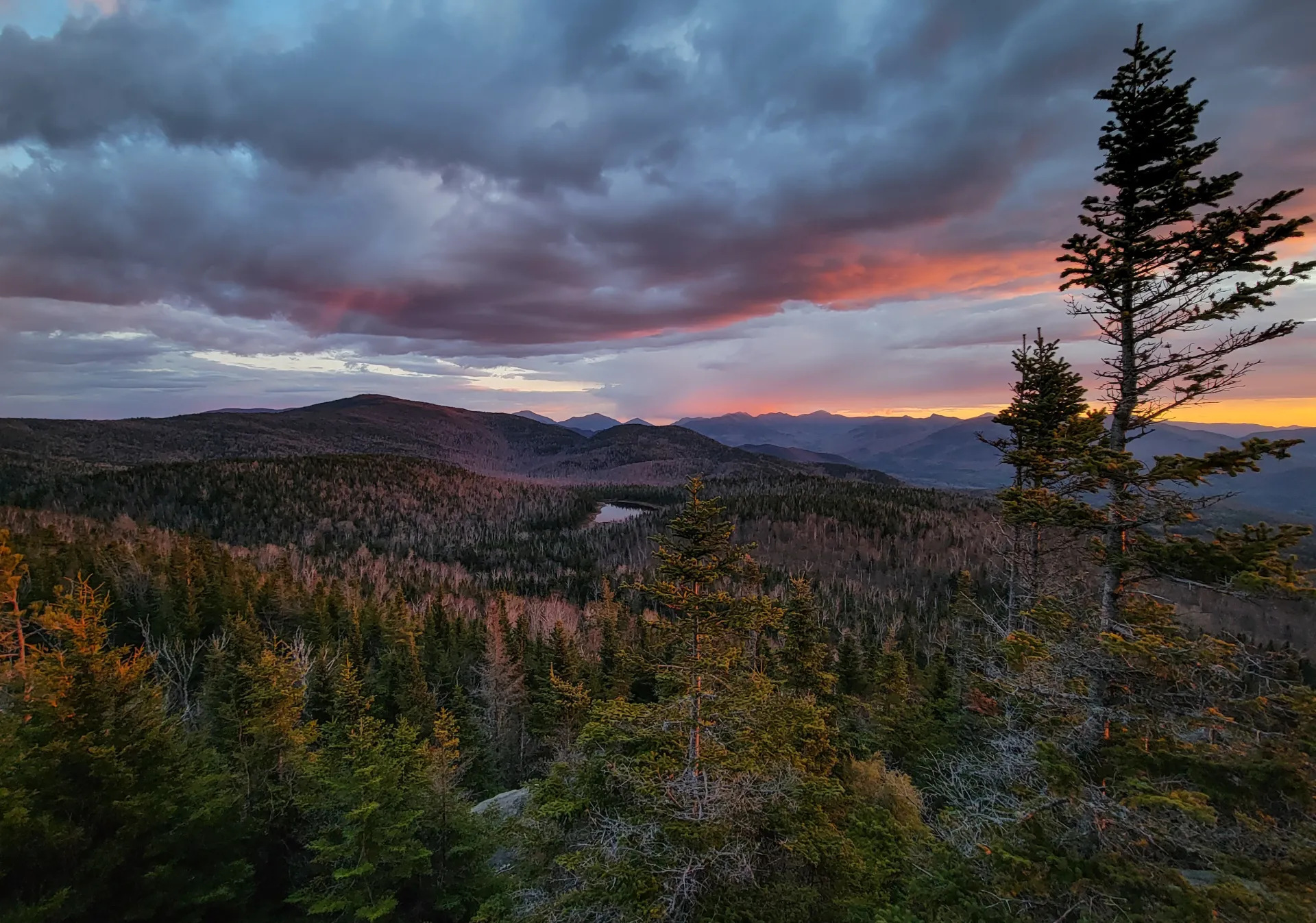 An extensive mountain view at sunset