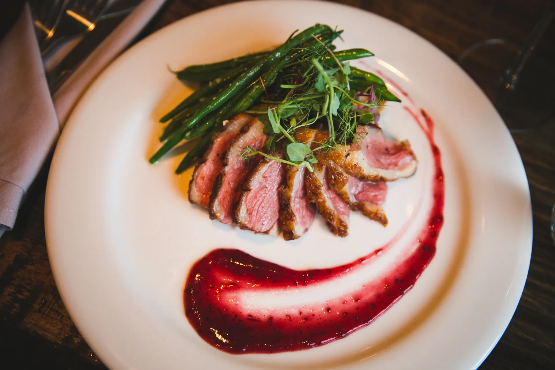 Duck breast with green beans.