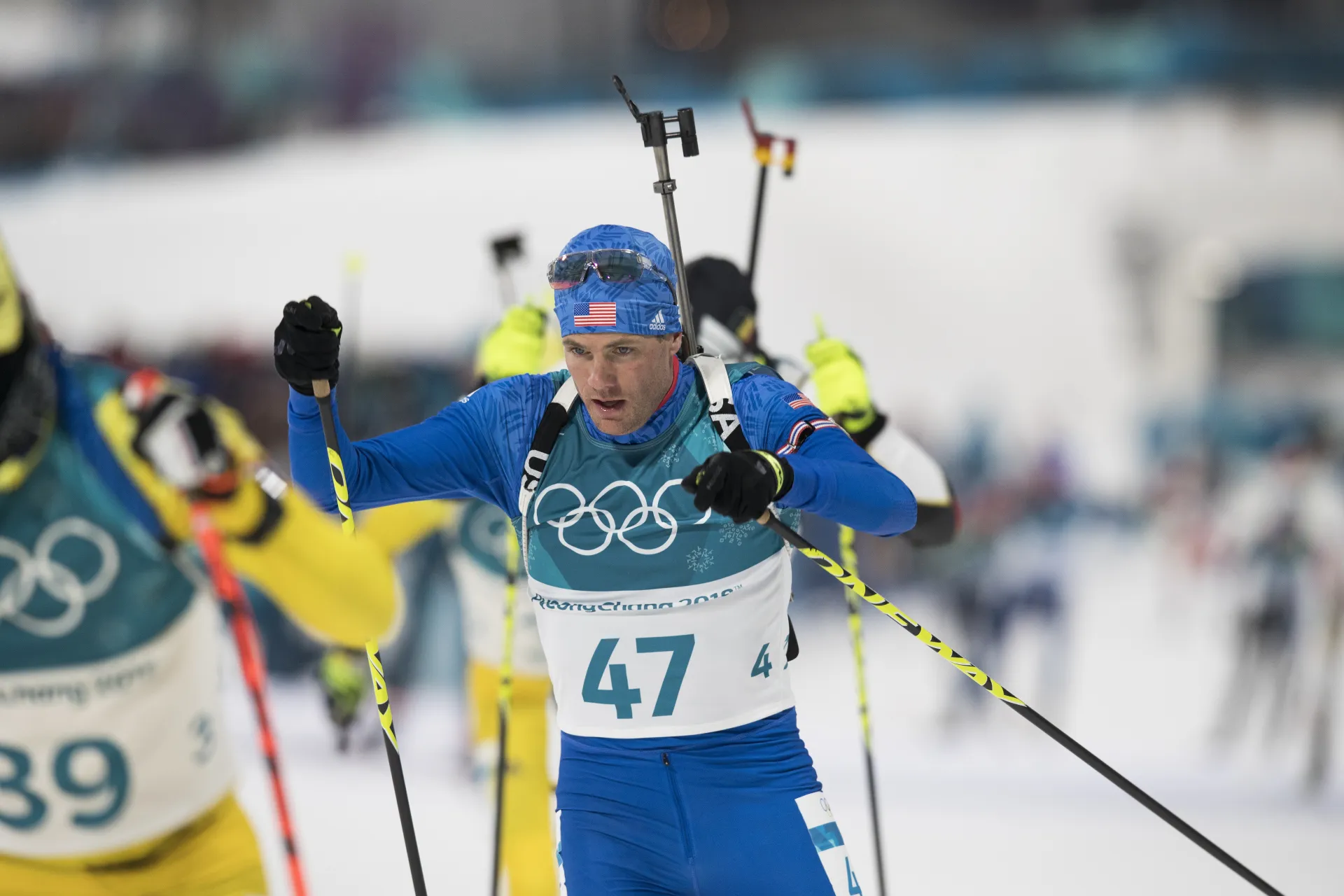 Tim Burke skis among other racers