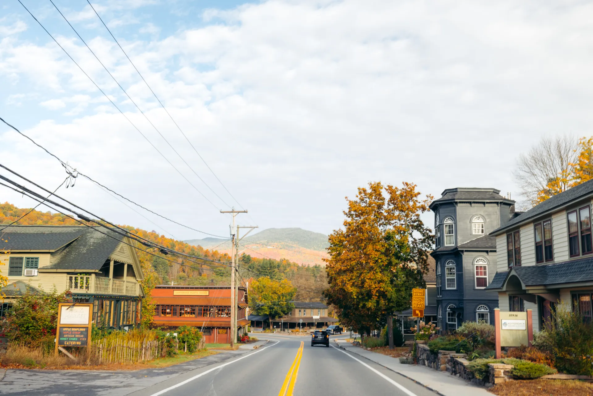 A photo of the Main Street in Keene, NY during the fall.