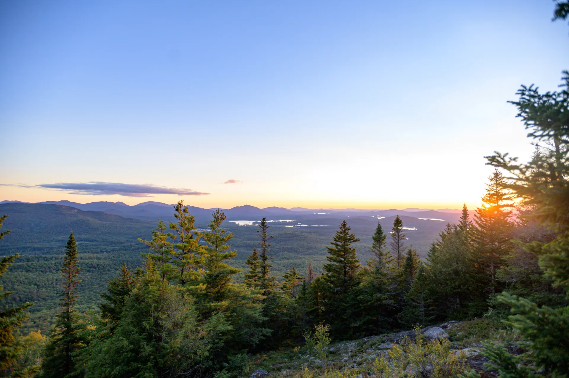 View of the sun setting from the summit of Haystack Mountain