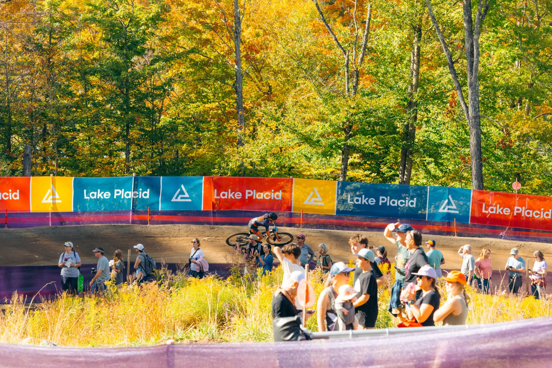 A competitor riding one of the berms on the course.