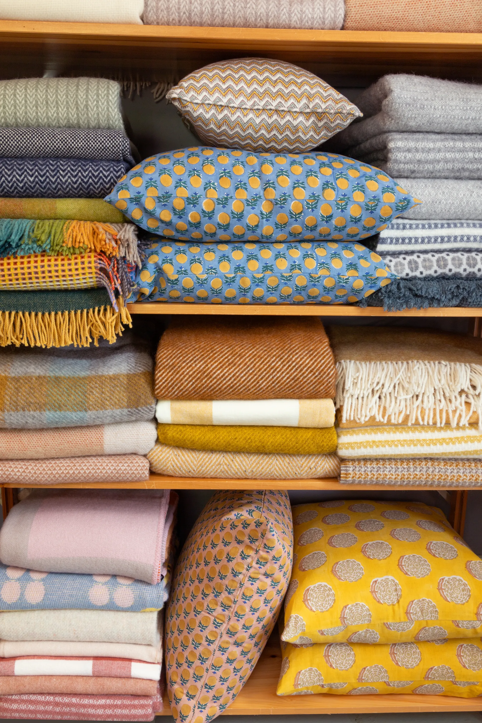 Pillows and wool blankets from floor to ceiling