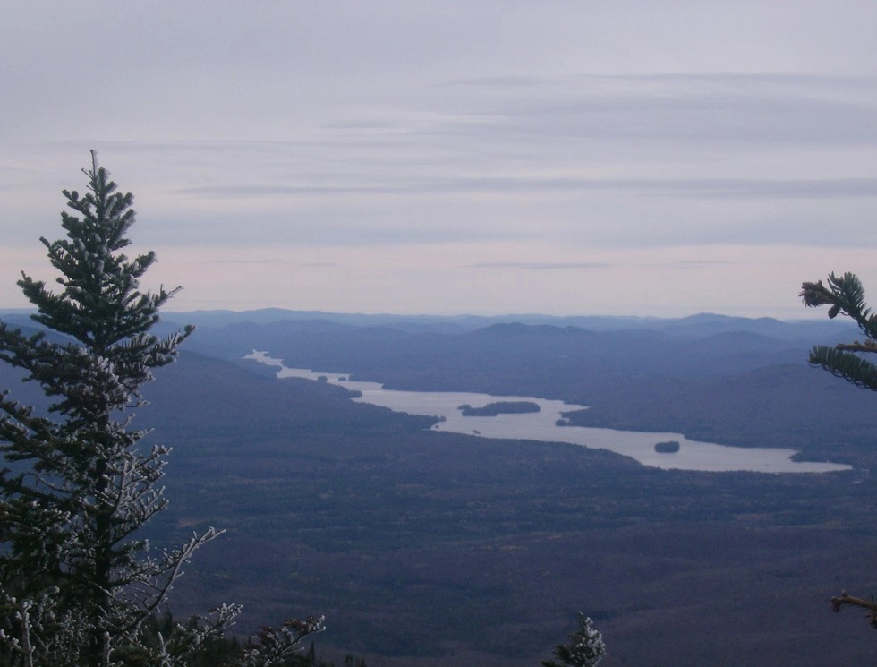 A long lake seen from atop a mountain