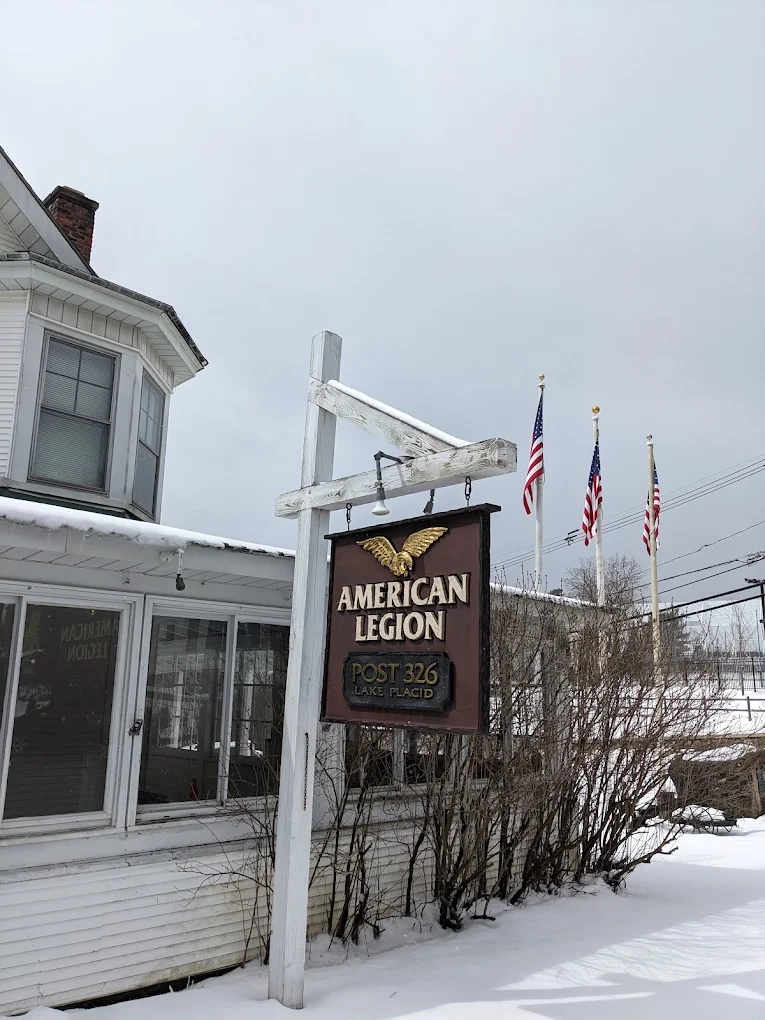 A photo of the exterior of the American Legion Post 326 sign blanketed in snow.