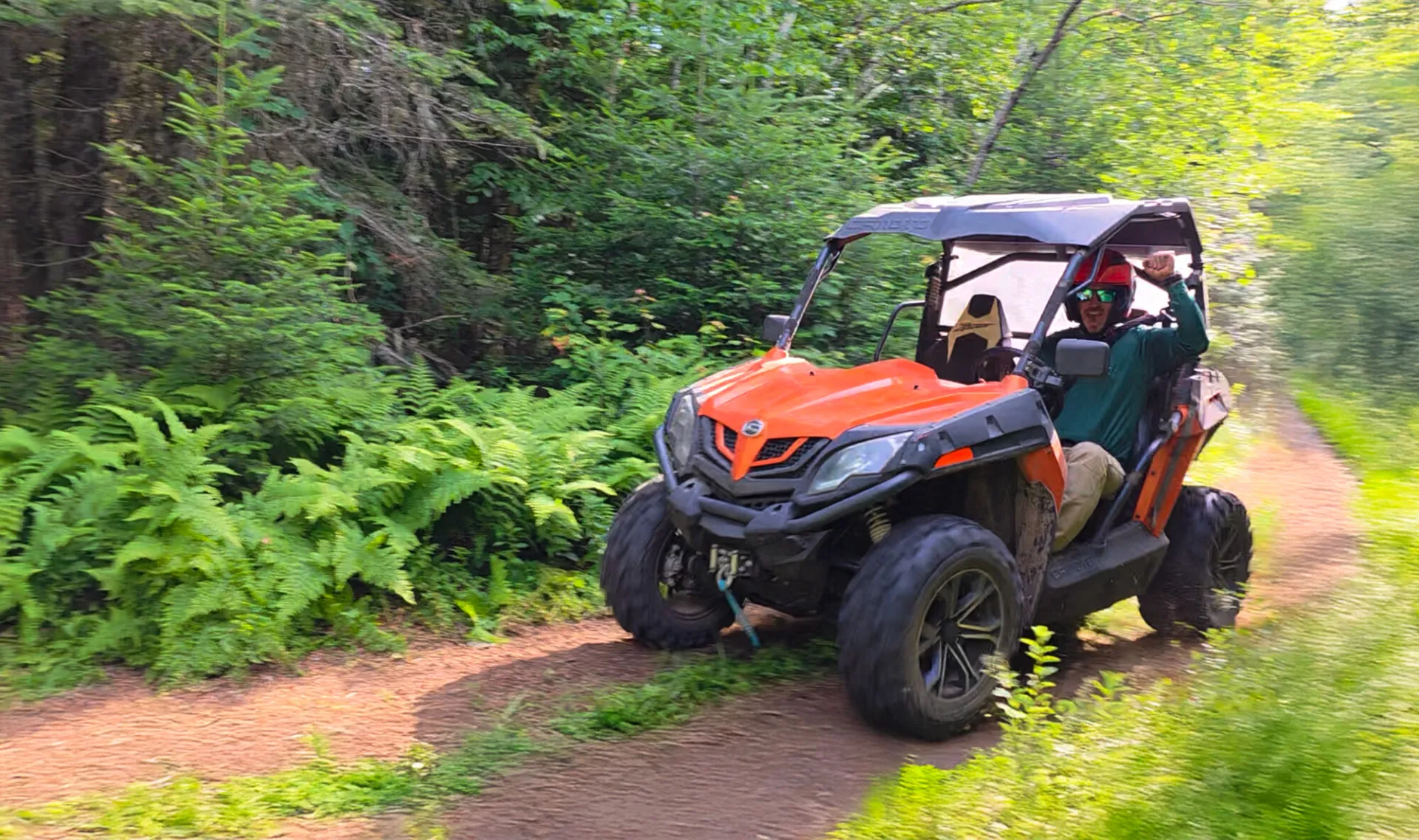 A guy driving a utv