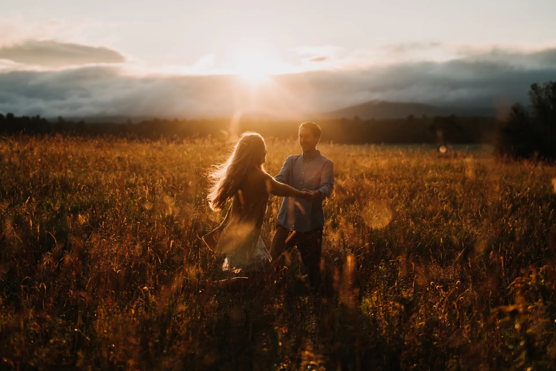 a couple in open wheat field