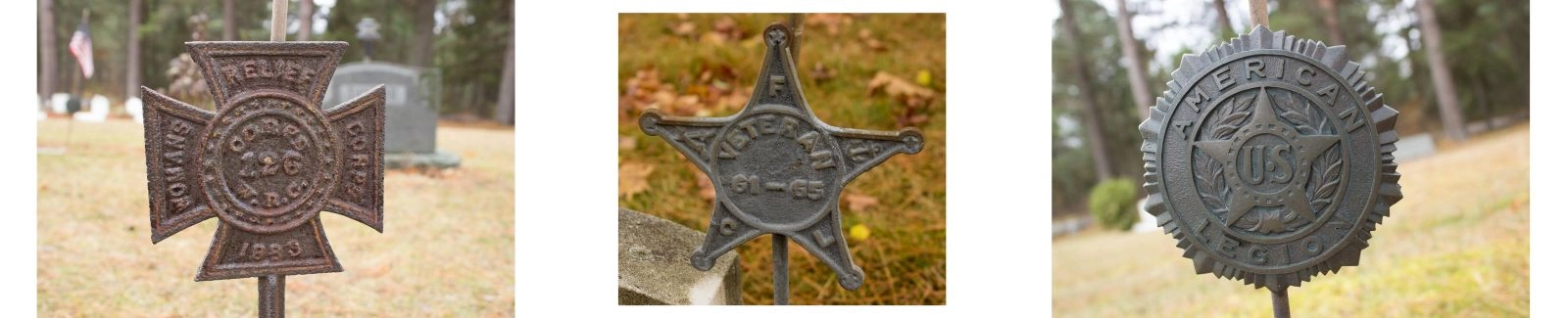On left, Spanish American War placard, middle is Civil War, right is generic American Legion flag holder
