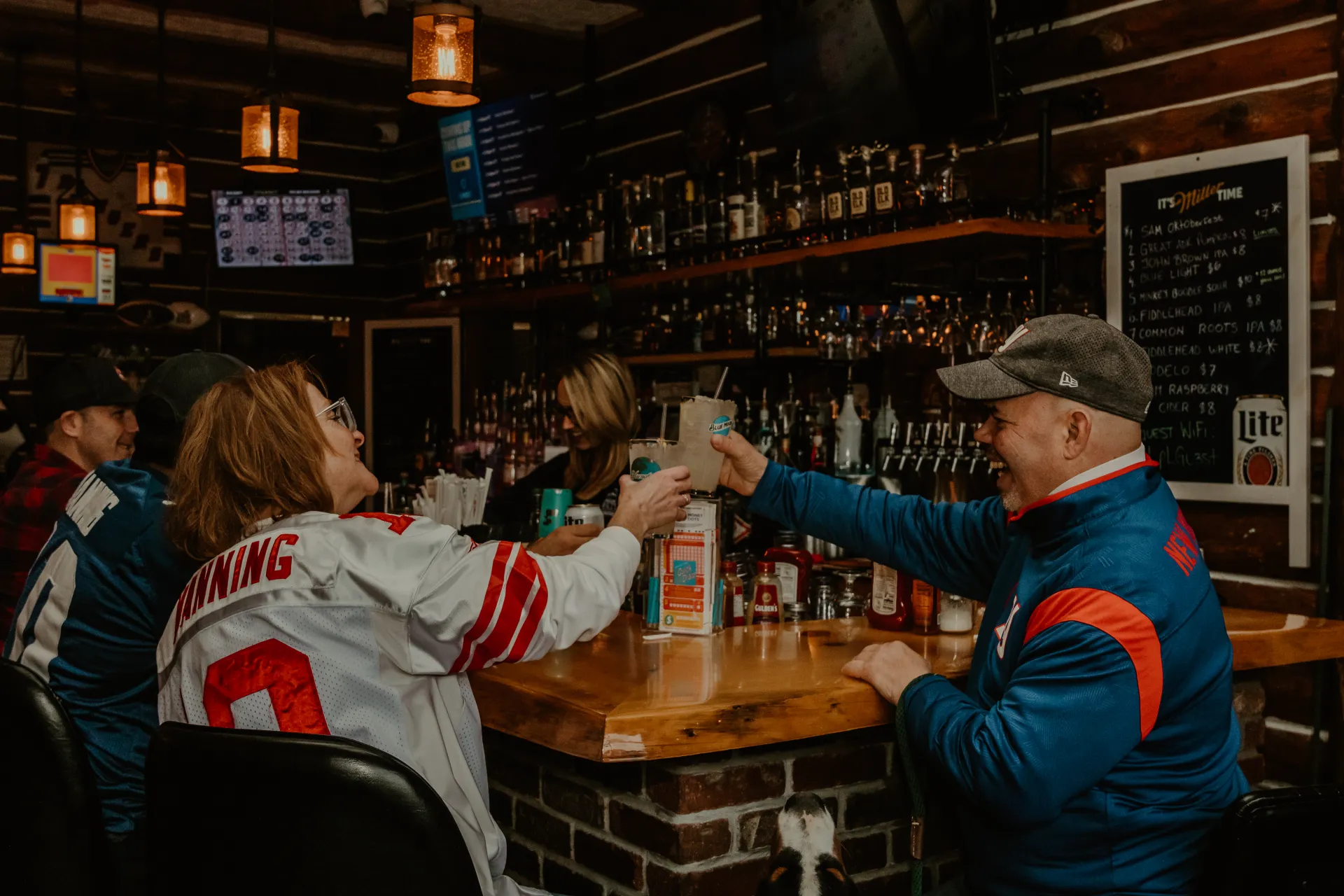 Patrons enjoy game day at the bar.  Photo Credit to A. Kelly.