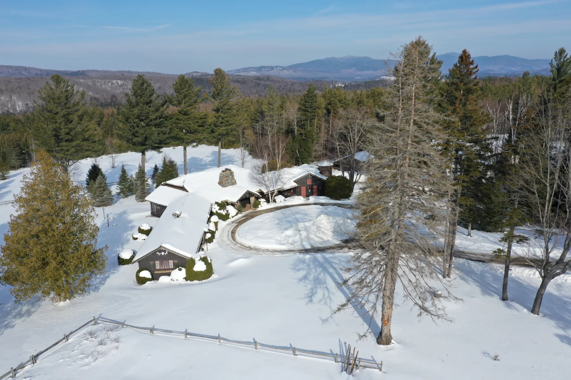 Aerial view of the snow-covered home.