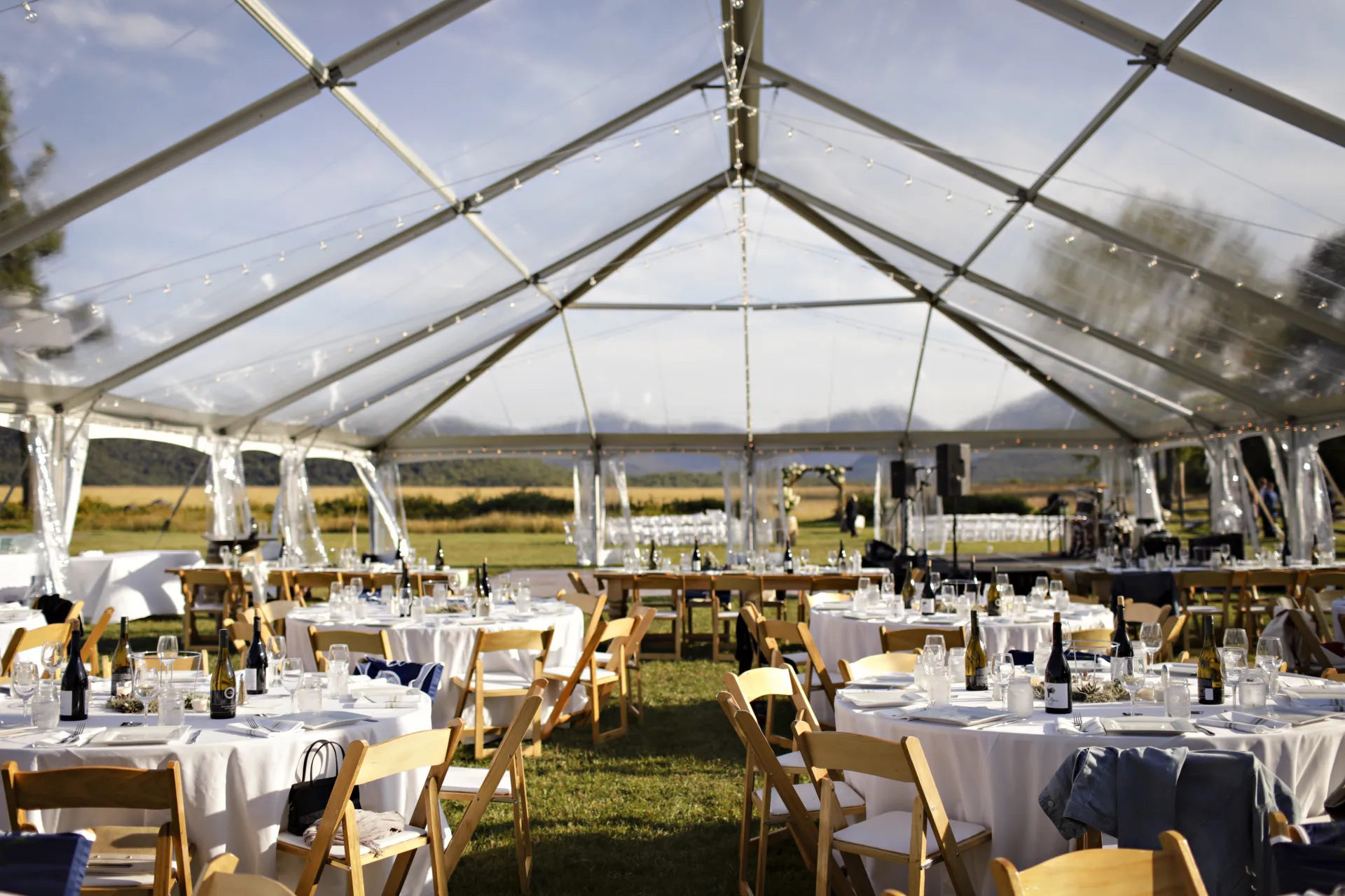 A clear tent allows the surrounding to be the decor