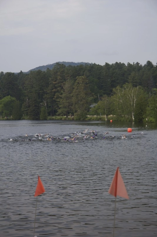 Swimmers make their way to the turnaround buoy