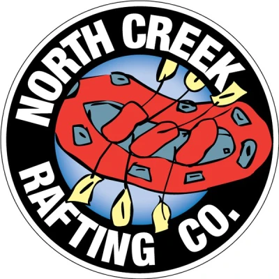 An illustration of a red raft with yellow paddles in a circle with the words North Creek Rafting Co