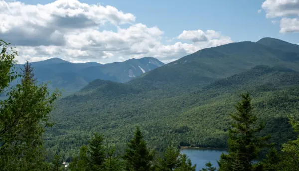Elevated view of Heart Lake, the MacIntyre Range, and Mount Colden on a summer day