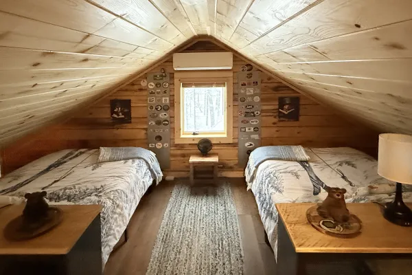 A loft space with two twin beds
