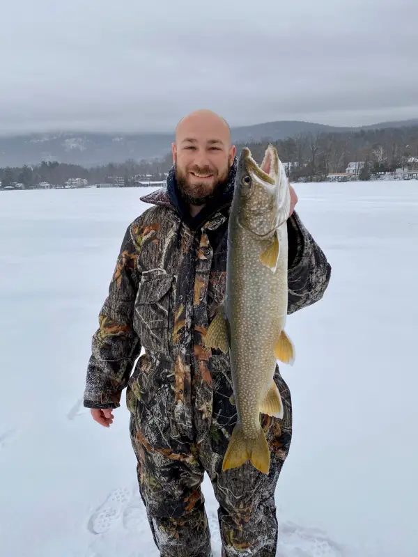 Man with large Great Northern Pike