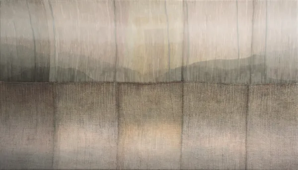 Art piece of unknown material pieces that appears to have a mountainous watercolor design