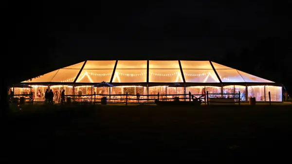Clear tent glowing in the night