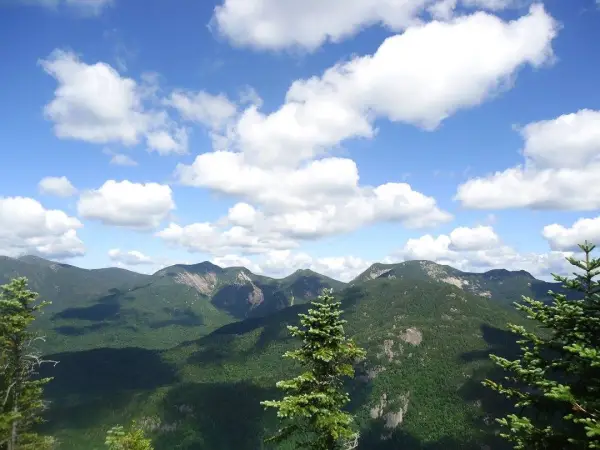 Sweeping view of nearby mountains from the summit of Mount Colvin.