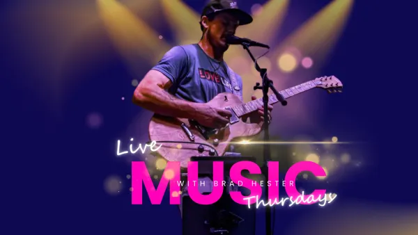 Man playing guitar on stage