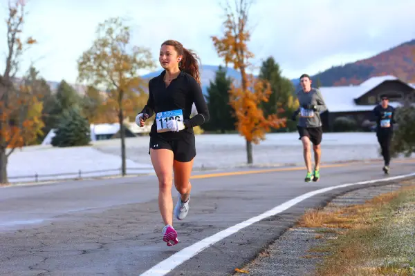 Runner in shorts on frosty fall morning