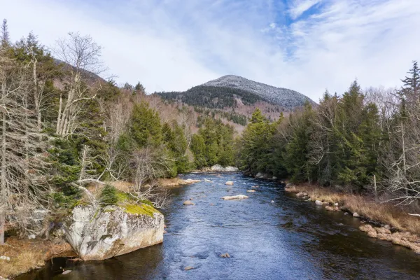 Scenic image of mountain and river in spring