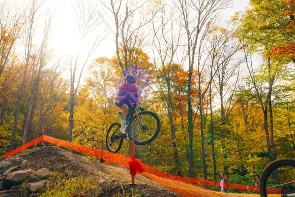 A competitor launch off of one of the jumps.