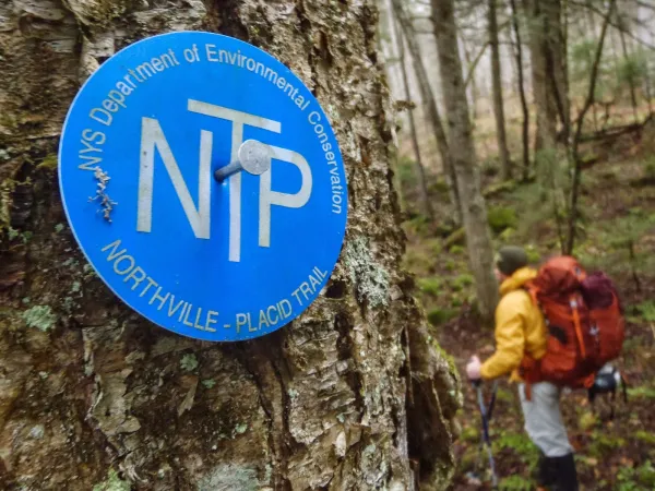 Northville-Lake Placid Trail marker is the signal for that incredible through hike you've been craving.