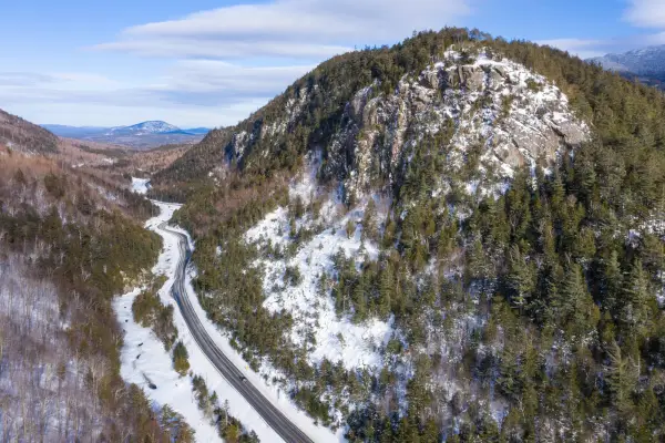 A road runs through a mountain pass.
